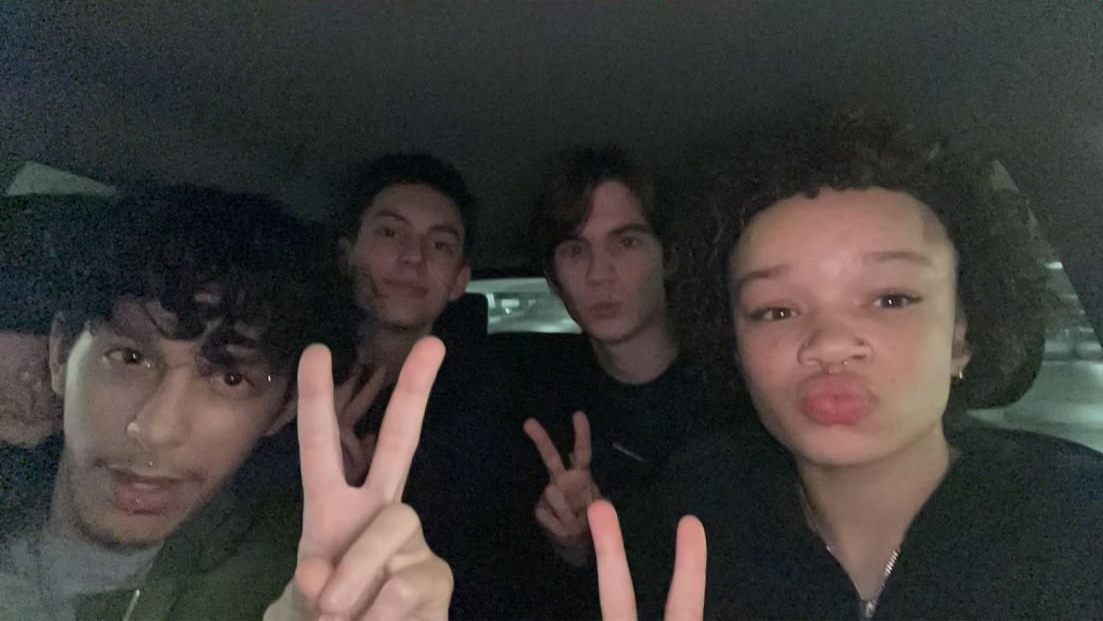 a picture of me in a car with three of my friends